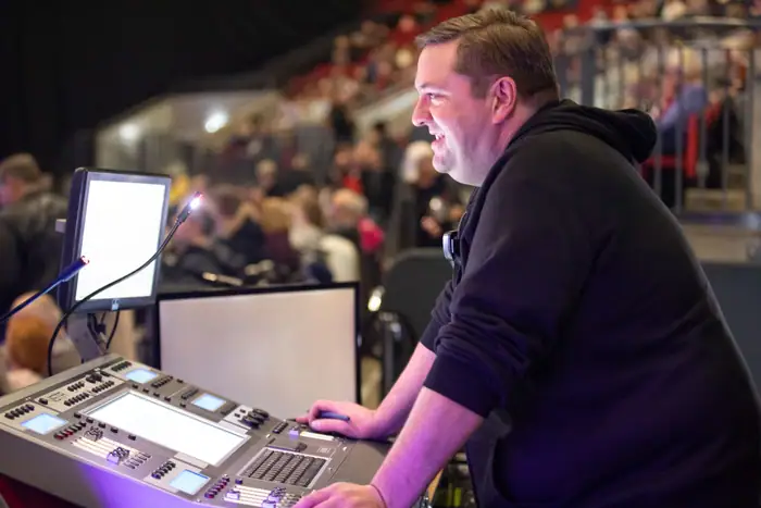 Dave Catley programming a lighting console